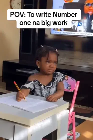 'Write figure 1' - Little girl cries a river as she tries to do her maths homework