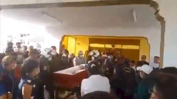 'Dead' woman knocks on coffin at her own funeral