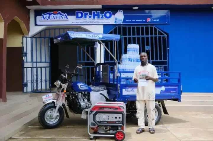 Aquafina empowers viral hawker, Dr. H20, rewards him with full business setup worth millions of naira
