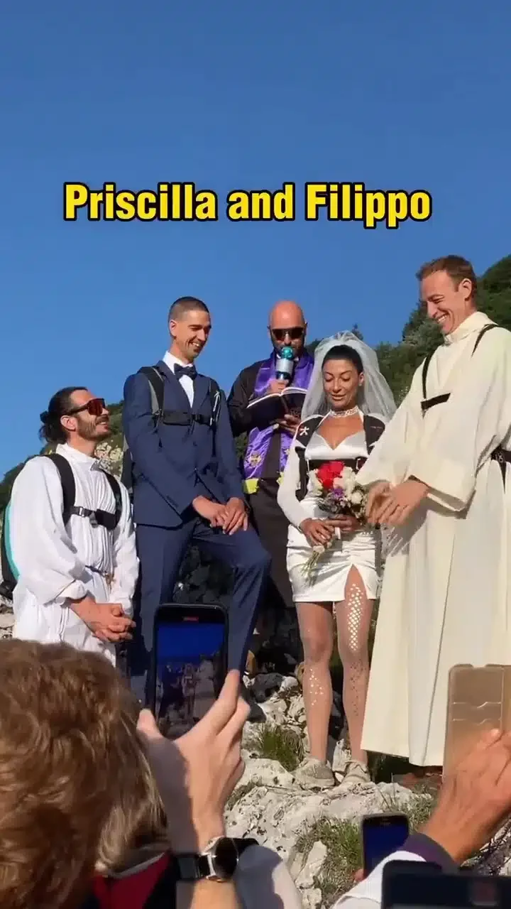 'Na this kind wedding I go do' - Netizens react as pastor orders couples, guests to jump off cliff during wedding ceremony (Video)