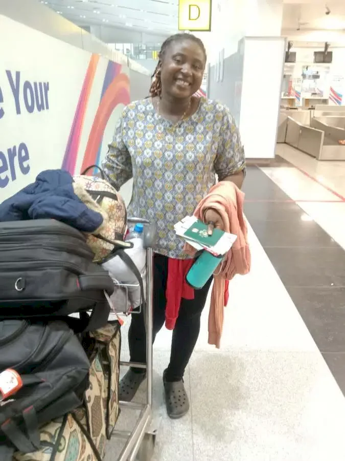 Lady overjoyed as she relocates abroad with family