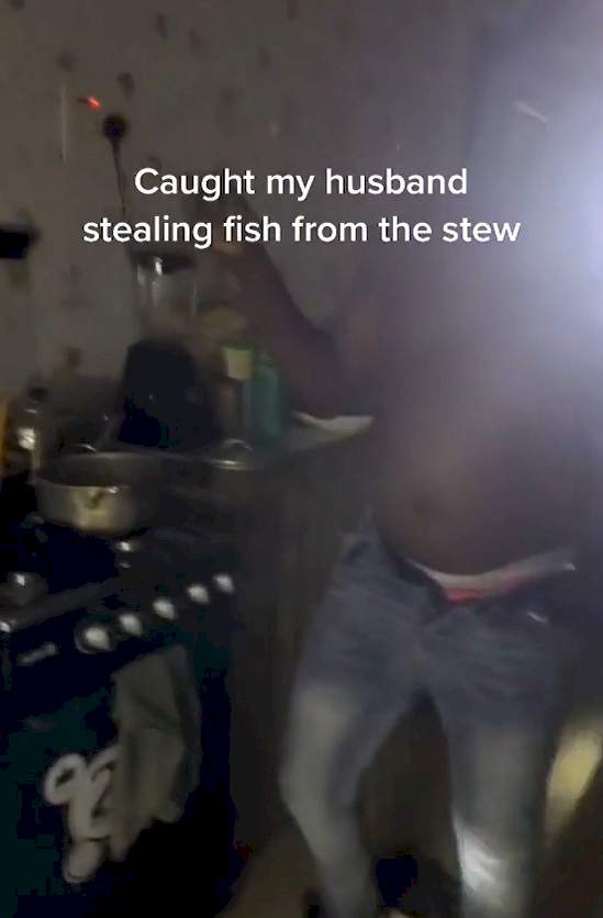 "Abeg, I no go do am again" - Man surrenders, begs wife after she caught him stealing fish from stew pot (Video)