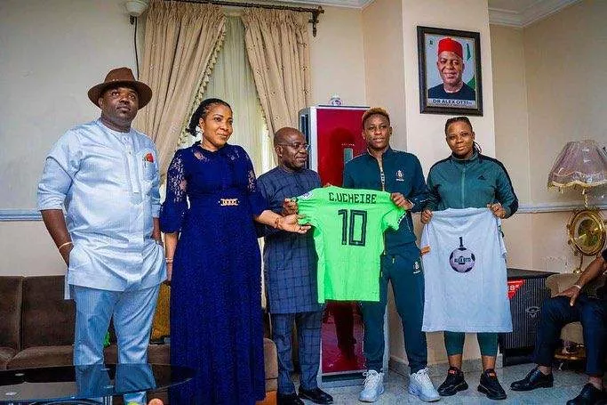 The post includes photos of Uchiebe presenting Governor Otti with a Super Falcons and Benfica jersey. (Instagram/Christy Uchiebe)