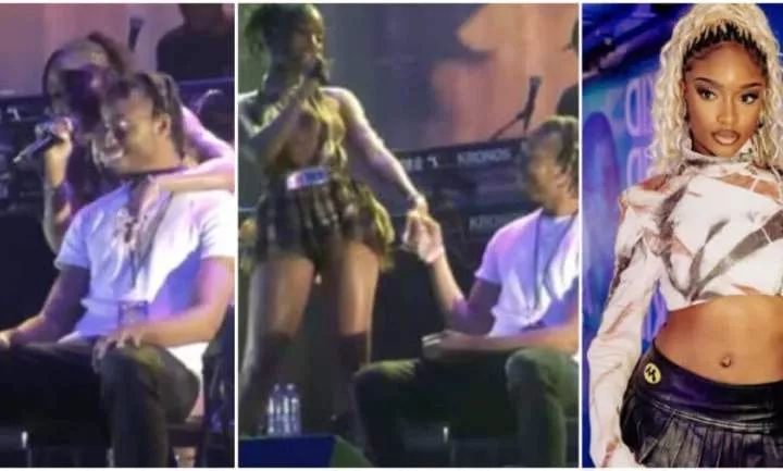 'Imagination wan wound this one' - Reactions as Ayra Starr leaves fan blushing as she sings, hugs him on stage (Video)