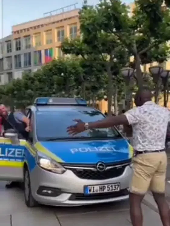 'I will also try this with Nigerian police' - Nigerians react as man stops police car in Germany, begs for a hug