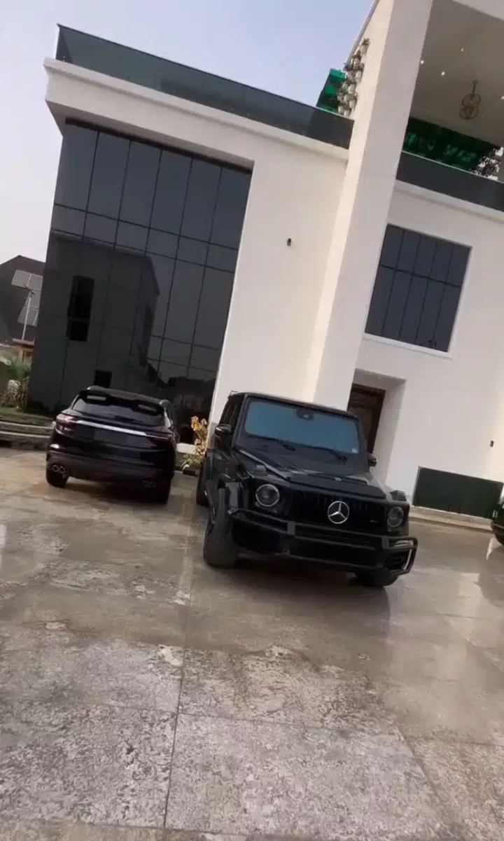 'Na wetin she see be this' - Reactions as Cubana Chief Priest flaunts cars, house amidst side chic saga