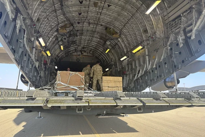 A U.S. C-17 sits at the Nevatim Air Base in the desert in Israel on October 13. The aircraft arrived with crates of American munitions for Israel. 