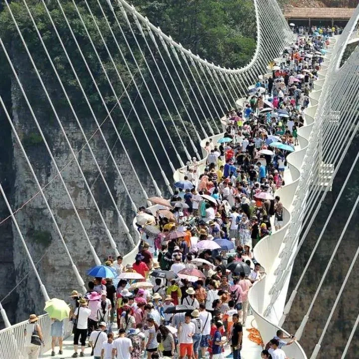 See How The Chinese Glass Bridge Was Tested Before People Were Allowed To Cross (Photos)