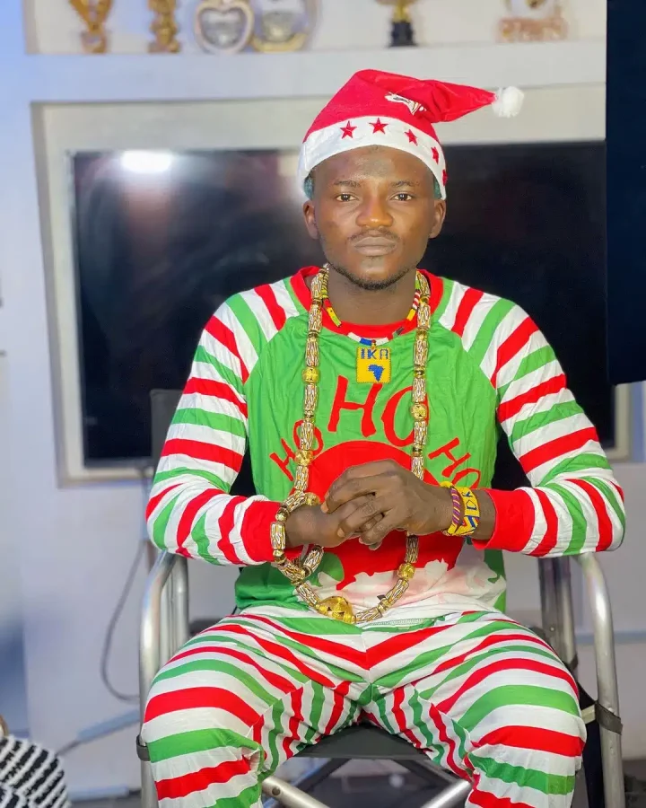 Portable hypes his boys as he shows off their Christmas outfits