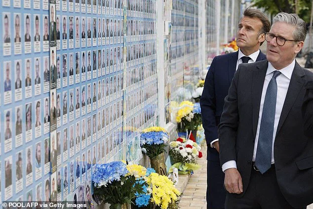 Britain's Prime Minister Keir Starmer (R), France's President Emmanuel Macron (L) and Ukraine's President Volodymyr Zelensky (not in picture) visit the Wall of Heroes of the Nation, a memorial wall of fallen Ukrainian servicemen, in Kyiv