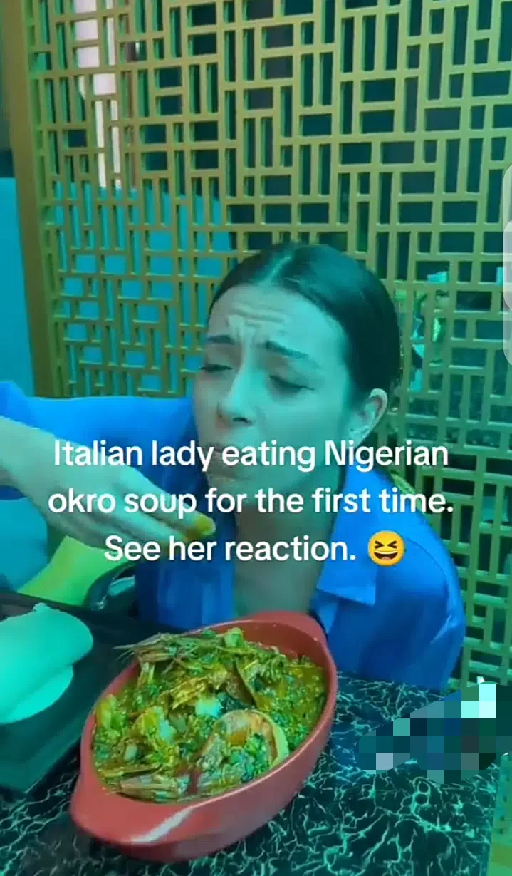 Italian lady stirs reaction as she tastes Nigerian Okra soup for the first time (video)