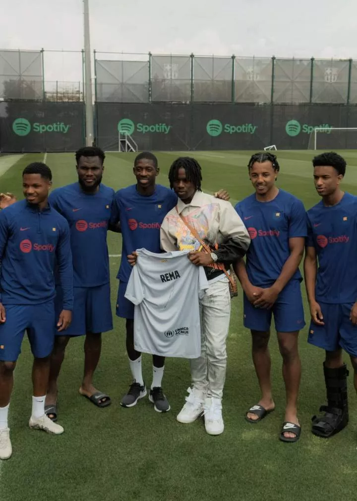 Rema pays visit to FC Barcelona, receives warm welcome from players