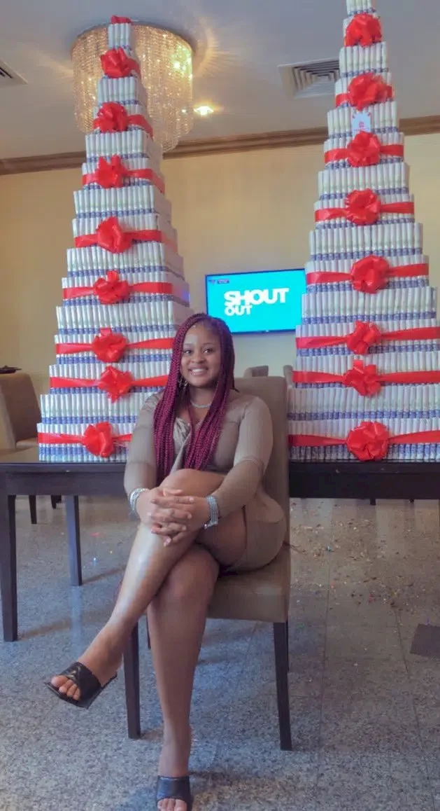 Amaka beams with joy as she receives gigantic money cake from fans (Video)