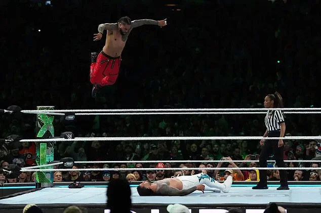 Jimmy Uso coming off the top rope against his brother Jey, but he would end up losing