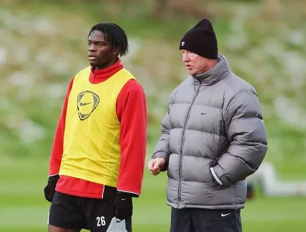 Louis Saha and Sir Alex Ferguson