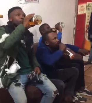Thieves forced to drink bottles of alcohol they stole from a shop in South Africa (video)