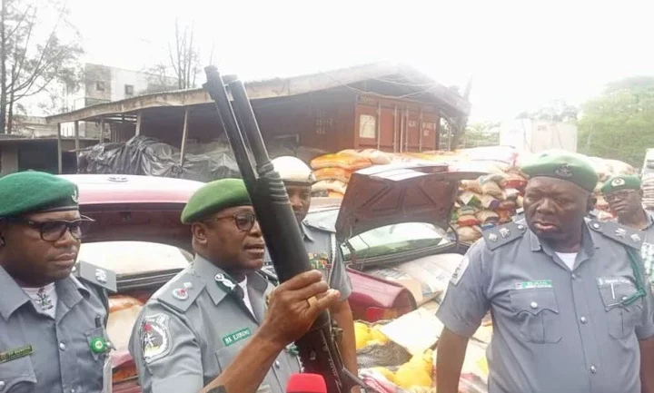 JUST IN: Customs seizes pump action rifles hidden inside garri sacks