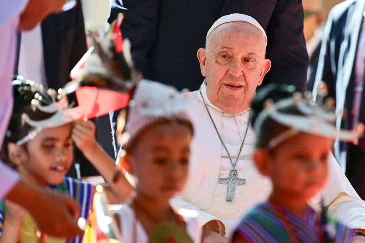 Pope Francis arrives for a visit to the Irmas Alma School for Children with Disabilities in Dili on September 10, 2024.