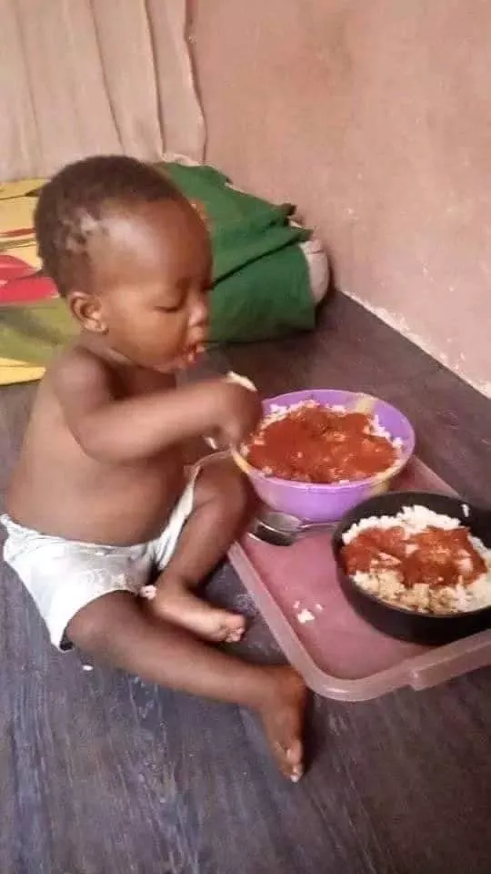Photo of little child devouring large bowl of rice causes serious buzz online