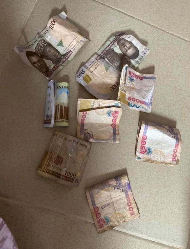 Lady cries out as she reveals what she found after breaking piggy bank