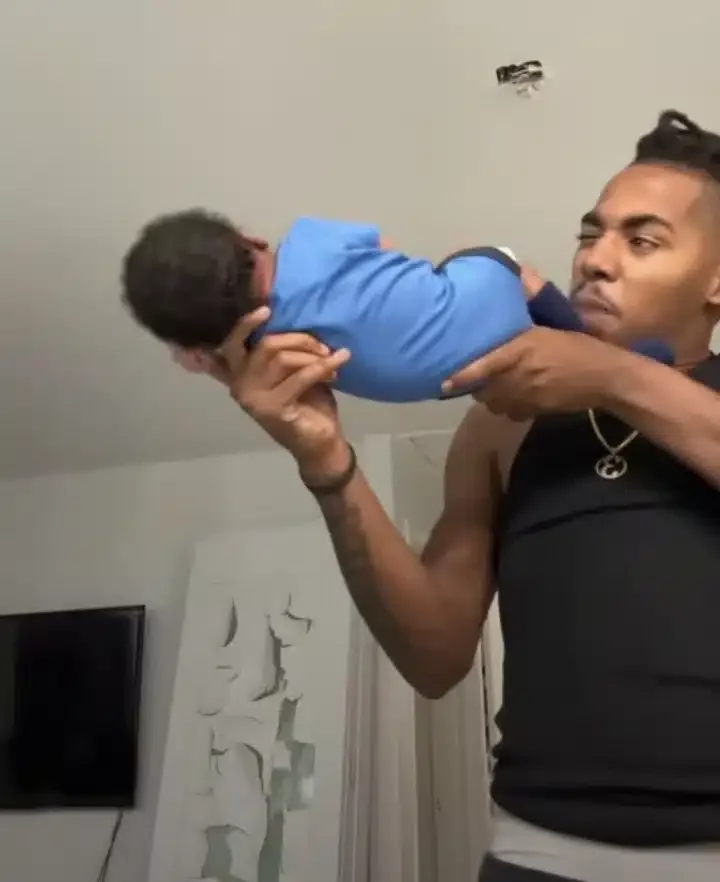 'Leave my son alone' - Wife reacts as her husband turns their baby into human gun (Video)