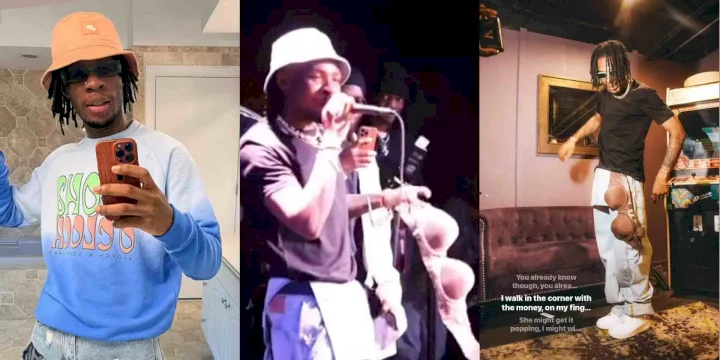 Joeboy strikes a pose with underwear thrown at him by fan during performance (Video)