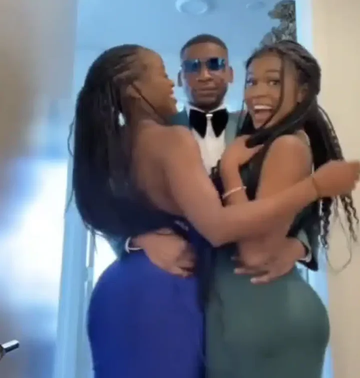 'E go still cheat on the two' - Reactions as young man shows off living with his two girlfriends