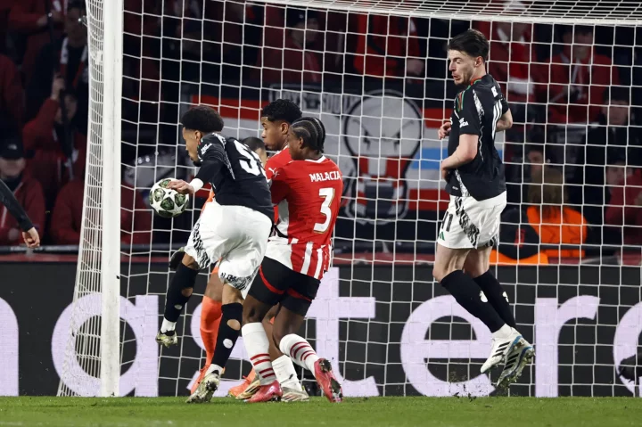 Arsenal's Ethan Nwaneri scores a goal during a UEFA Champions League match.