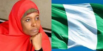 Mixed reactions as Aisha Yesufu refuses to stand up for new national anthem (Video)