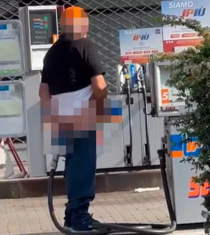 Man caught shoving the nozzle from a petrol pump up his bum while stroking his member at petrol station (+18 video)