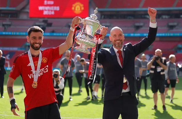 Bruno Fernandes celebrates with Erik ten Hag after winning the FA Cup with Manchester United