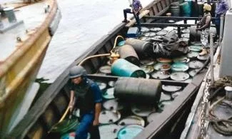 Nigerian Navy Intercepts Boat Ferrying 10,000 Petrol Litres To Cameroon, Arrests Three