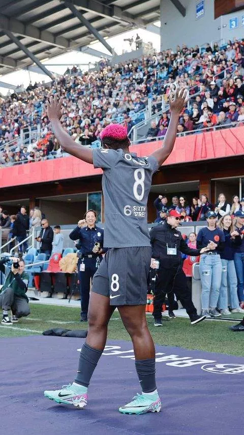 Super Falcons of Nigeria star Asisat Oshoala celebrates as Bay FC defeats the Seattle Reign.