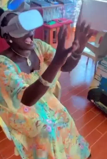 'She dey fight demon' - African mother causes buzz as her daughter takes her out to play a 3D reality game, Video trends