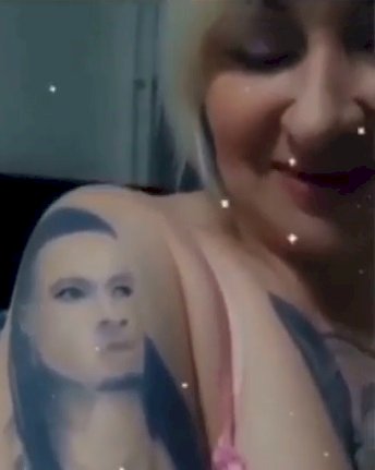Russian lady inks tattoos of Flavour's face, says he is the best singer (Video)