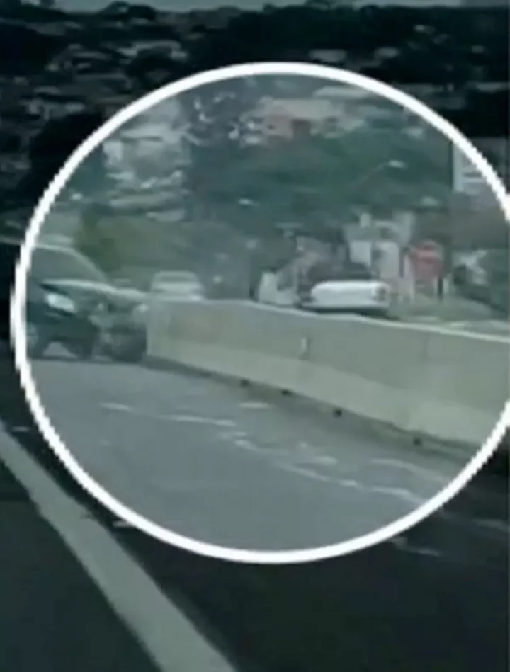 Woman speeds off and flings ex from bonnet after he clung to her car when she dumped him (video)