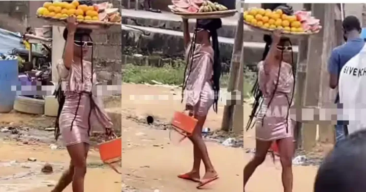 "When you hustle, make it fancy" - Lady spotted hawking fruits on the street in fashionable outfit