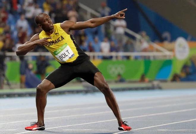 TODAY IN HISTORY: Bolt Breaks Olympic Record In Seconds - Buhari Signs Not Too Young To Run Bill