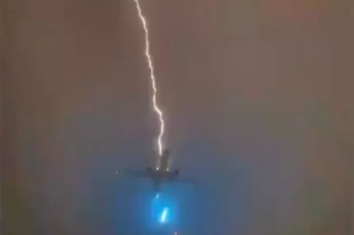 Terrifying moment lightning bolt strikes Air Canada plane just seconds after take-off (video)