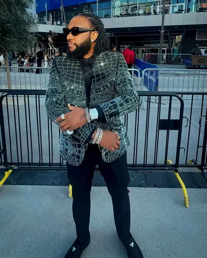 Kcee gifts band members exotic cars