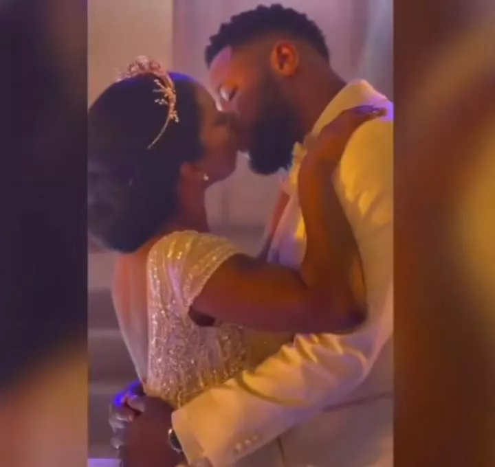 Video of a couple sharing their first kiss during wedding reception sends the internet into Frenzy (watch)