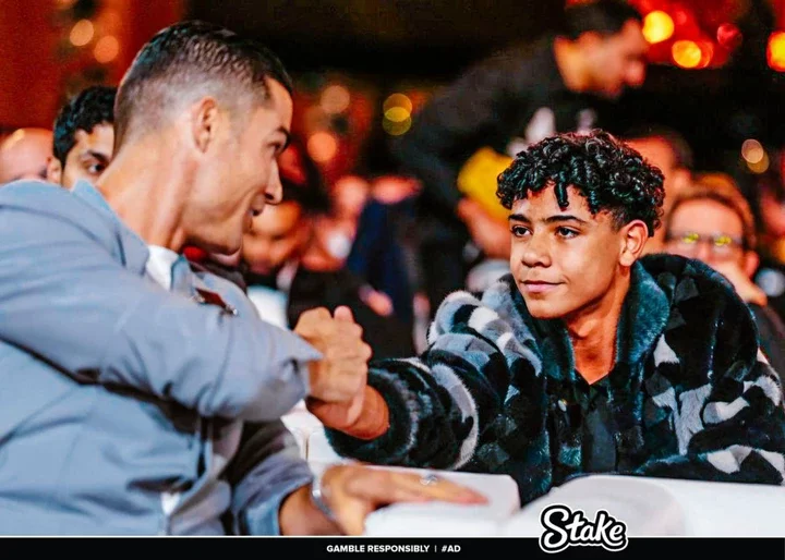 Reactions as Cristiano Ronaldo's son was spotted congratulating him after winning a globe soccer award