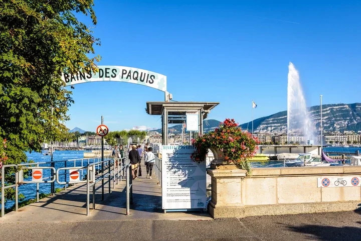 Image may contain Water Waterfront Nature Outdoors Scenery City Person Architecture Fountain Road Sign and Sign