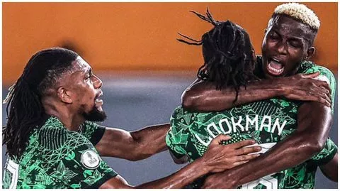 Alex Iwobi and Victor Osimhen celebrate a goal with Ademola Lookman at the AFCON 2023.