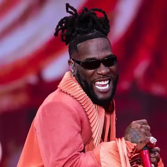 Burna Boy causes buzz as he storms Lagos club with briefcase full of pounds