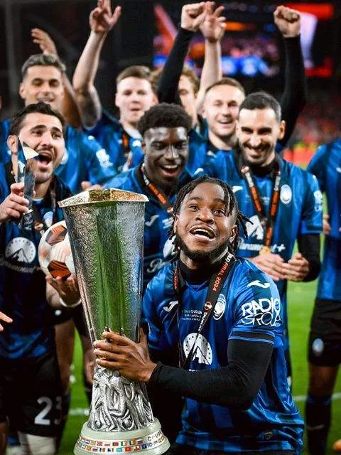 Ademola Lookman lifts the Europa League title after a historic display against Bayer Leverkusen.