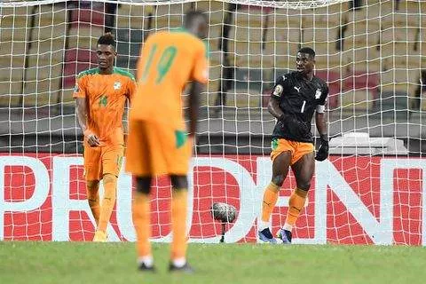 Ivory Coast captain Serge Aurier (R) finished the game in goal after Badra Ali Sangare hurt himself while conceding a bizarre equaliser at AFCON 2021