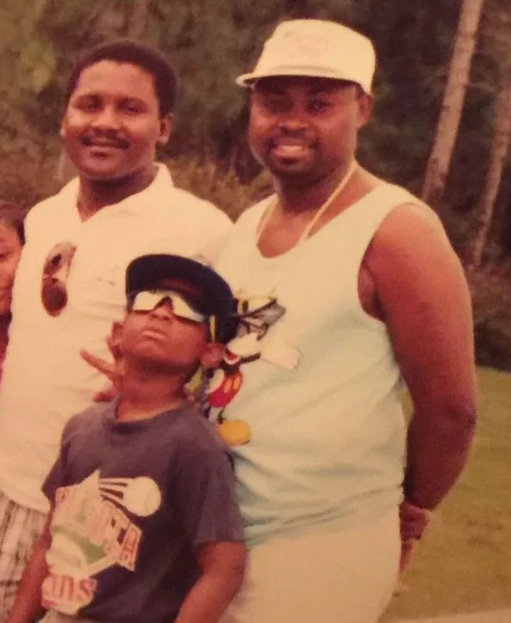 'Man was born with a silver spoon' - Nigerians react to throwback pictures of Davido, alongside his parents and Dangote