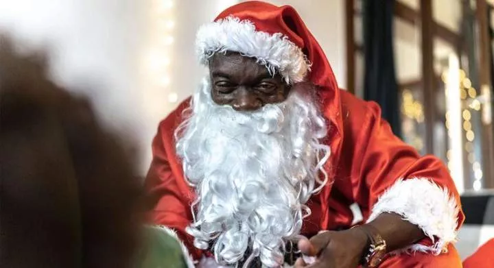 Why does Father Christmas wear red and white?