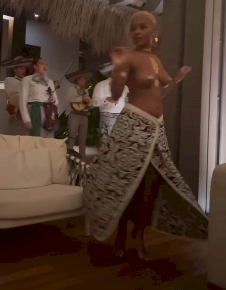 Janelle Monae goes topless at her birthday party (photos/video)